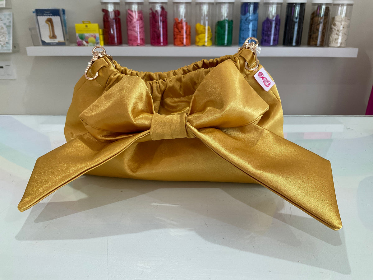 The Mimi Clutch in Gold