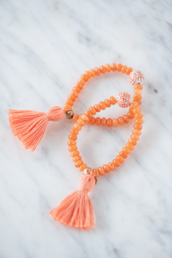 The Lowndes Tassel Bracelet in Orange - TheTinyTassel