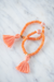 The Lowndes Tassel Bracelet in Orange