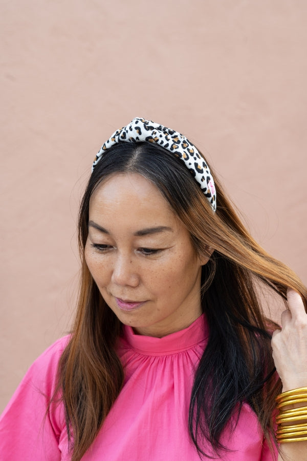 The Tiny Tassel Headband in White Leopard