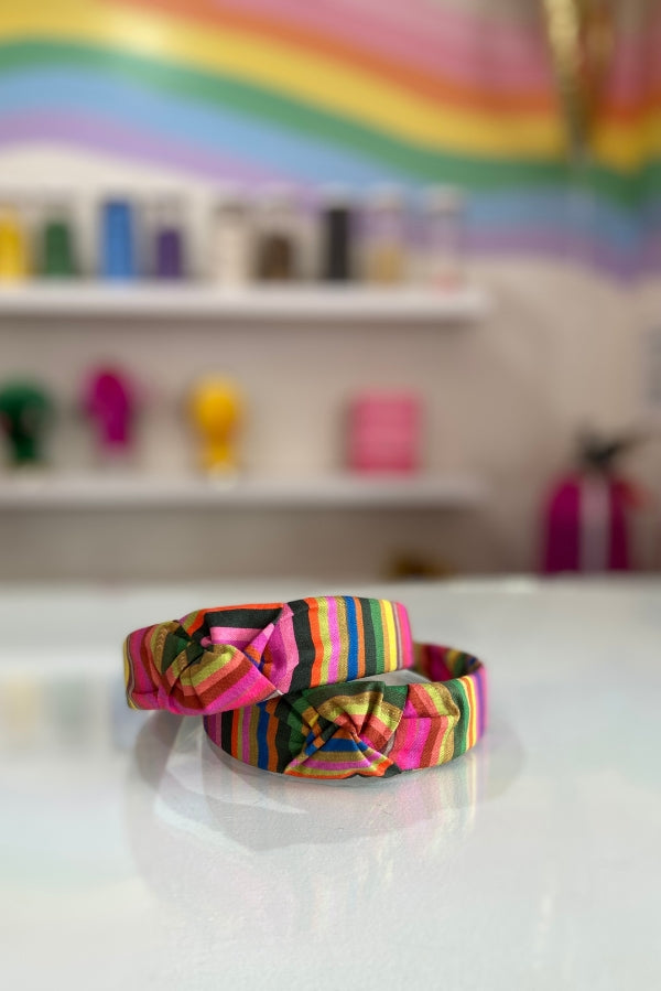 The Tiny Tassel Headband in Multicolored Stripes