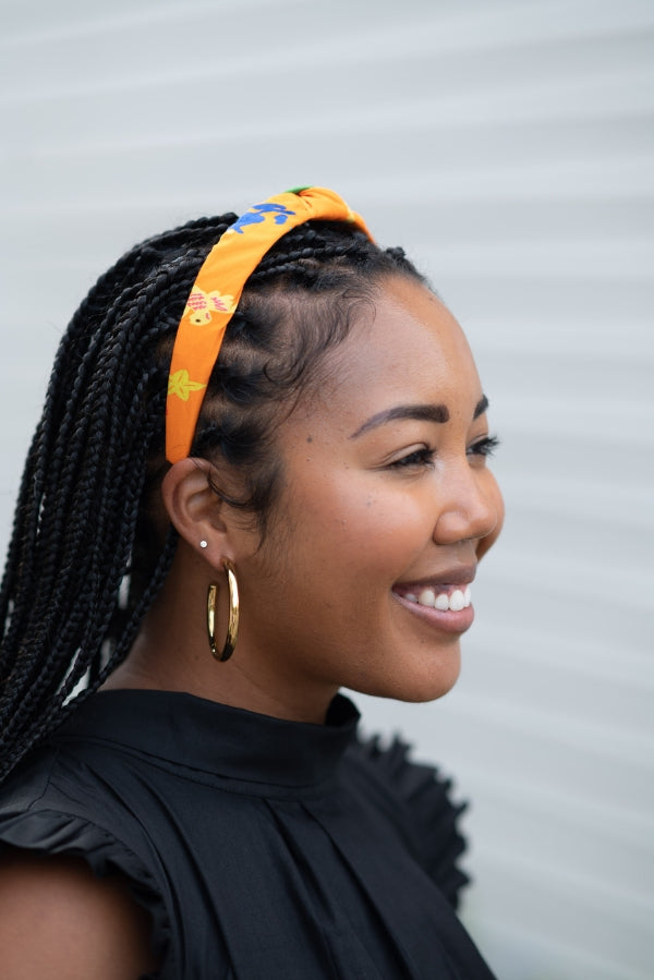 The Tiny Tassel Headband in Orange Happy Bird Print
