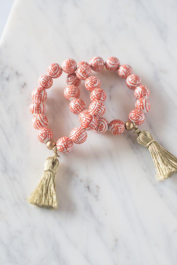 The Barre Tassel Bracelet in Orange - TheTinyTassel