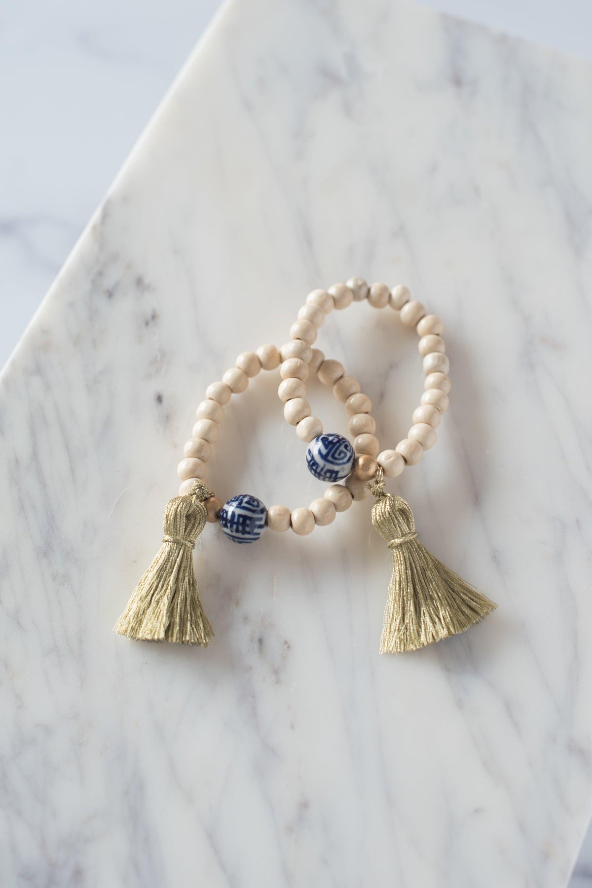 The Elliotborough Tassel Bracelet In Gold - TheTinyTassel