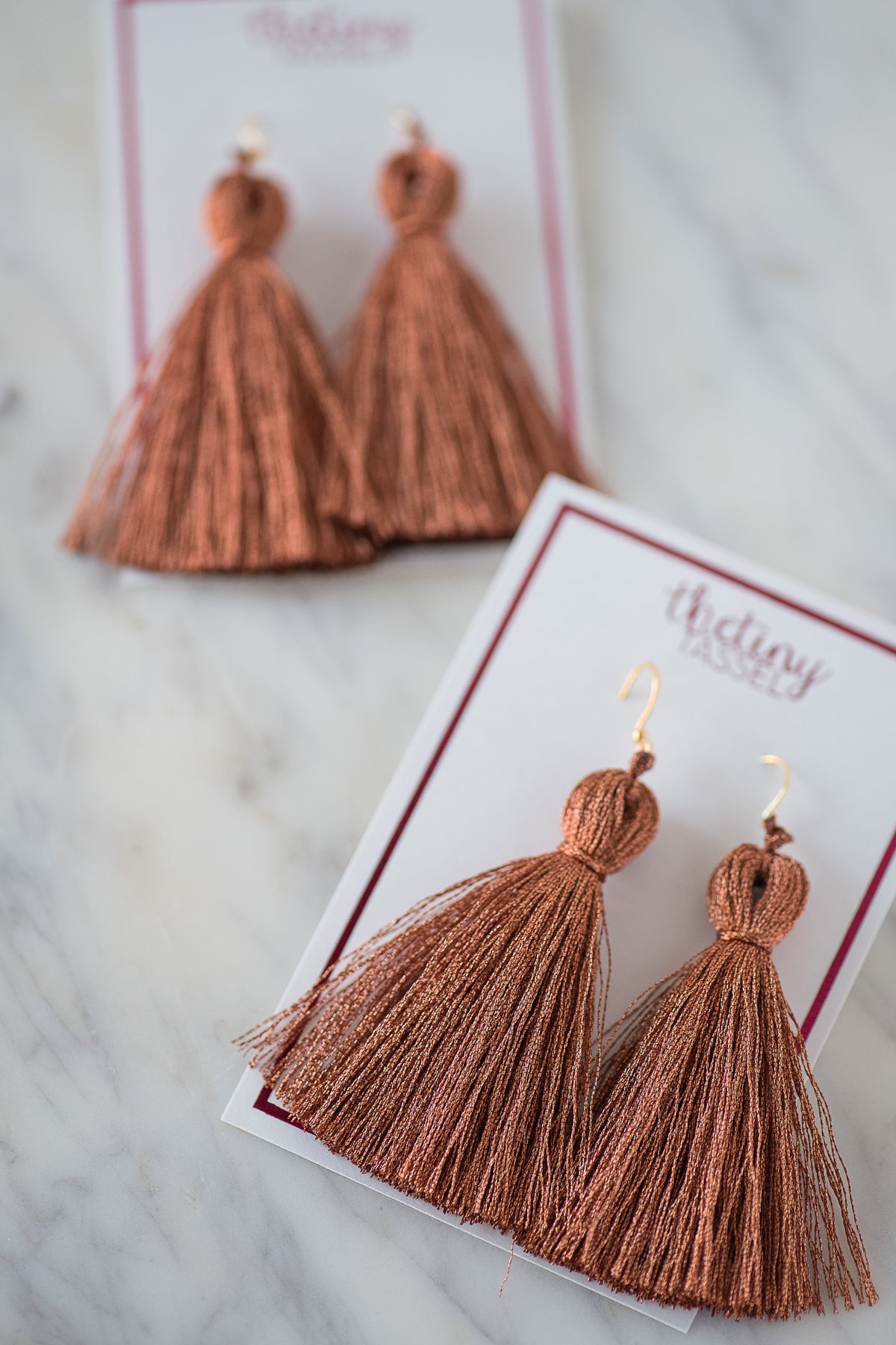 The St. Margaret Tassel Earring in Copper - TheTinyTassel