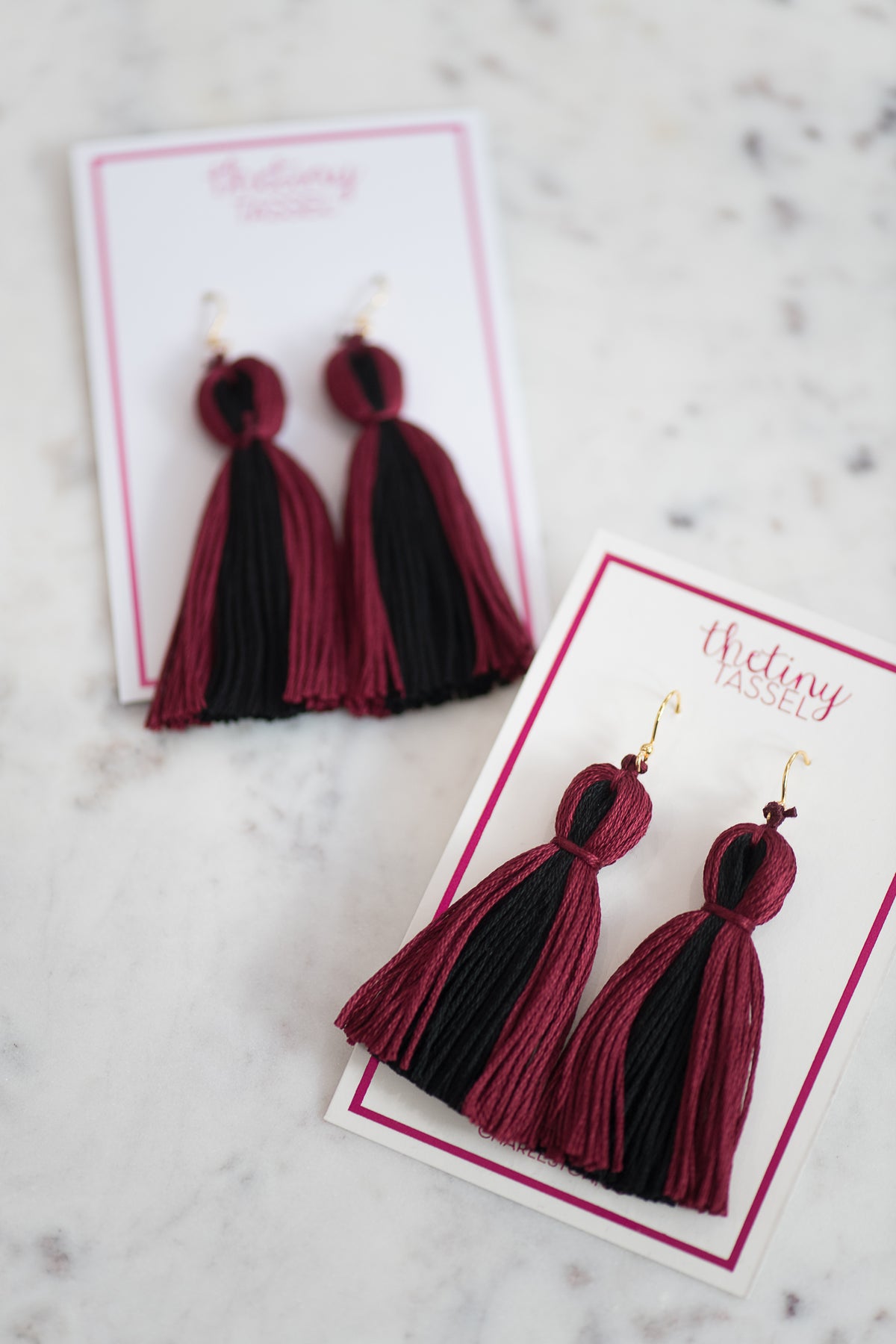 Buy Red Ruby Cubic Zirconia Embellished Tassel Earrings by Mero Jewellery  Online at Aza Fashions.