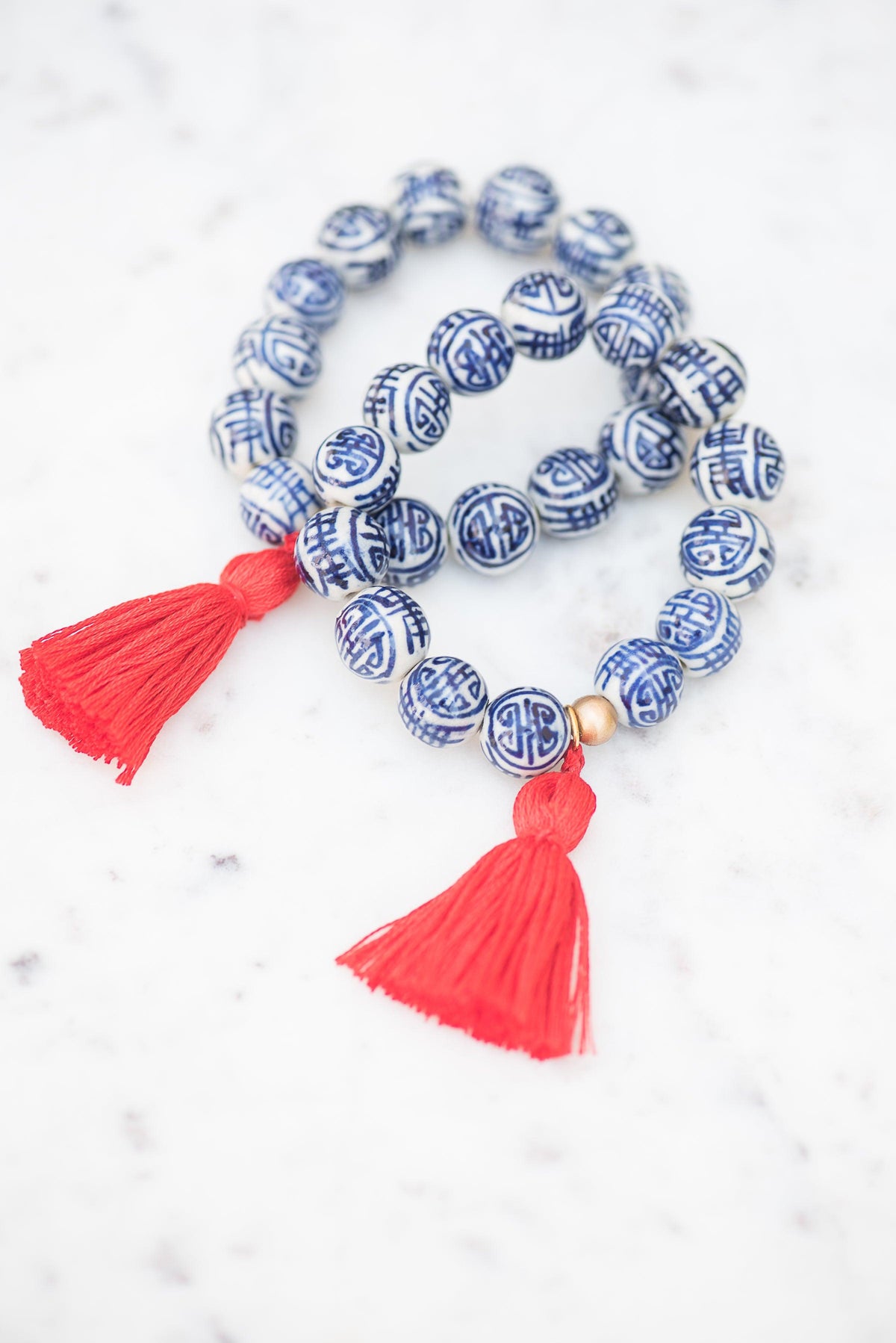 The Percy Tassel Bracelet in Red - TheTinyTassel