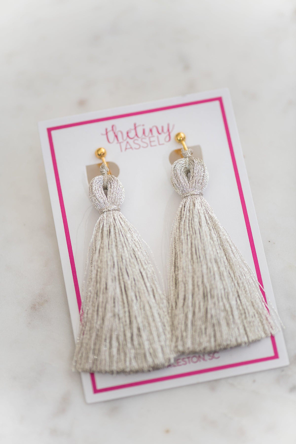 The St. Margaret Clip-On Tassel Earring in Silver - TheTinyTassel