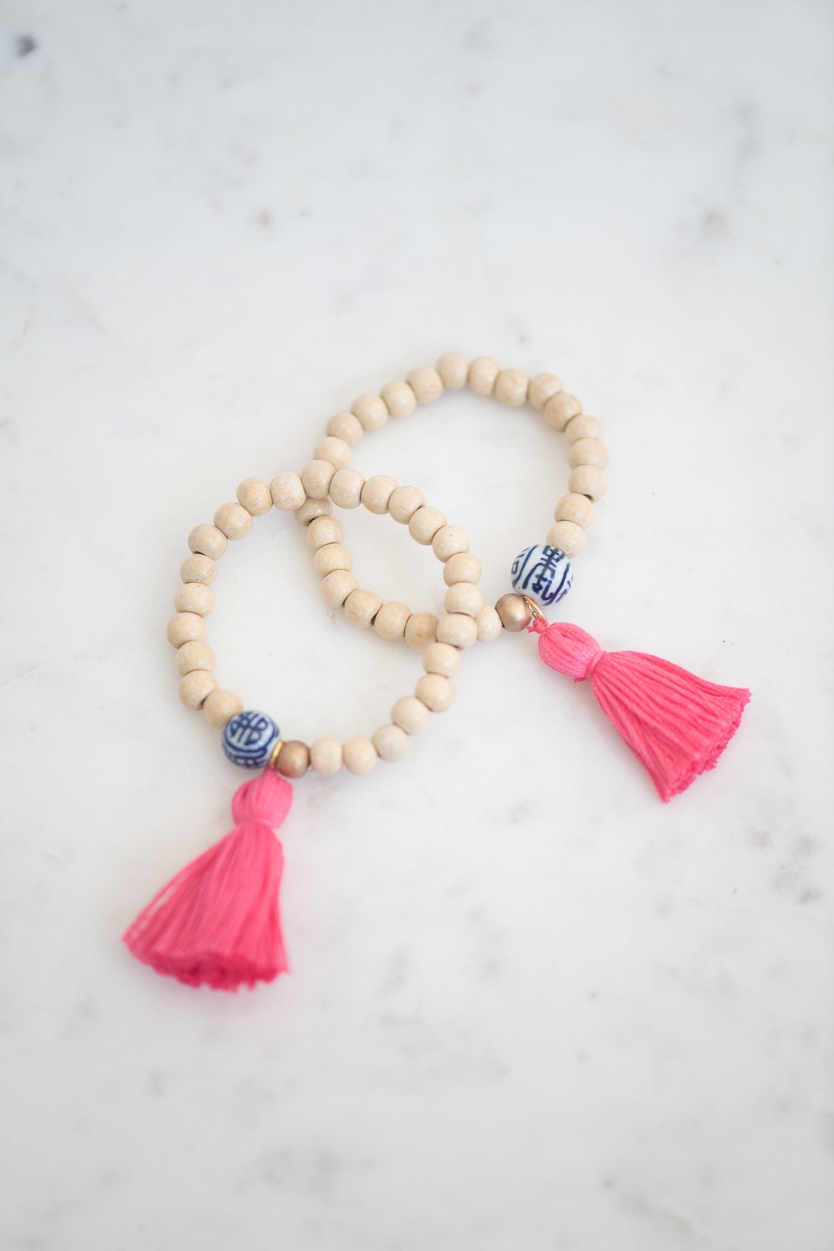 The Elliotborough Tassel Bracelet In Hot Pink - TheTinyTassel