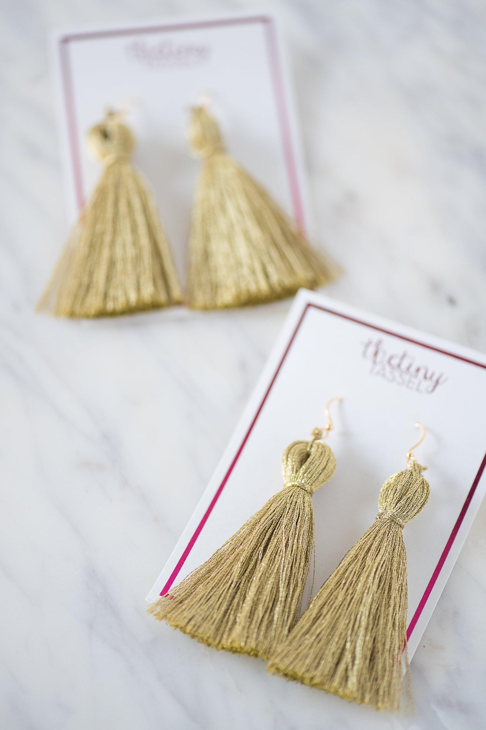 The St. Margaret Tassel Earring in Gold - TheTinyTassel
